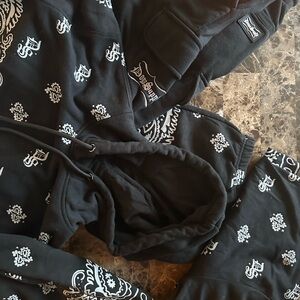 Men's Black Zip-Up Sweater with Graphic Design